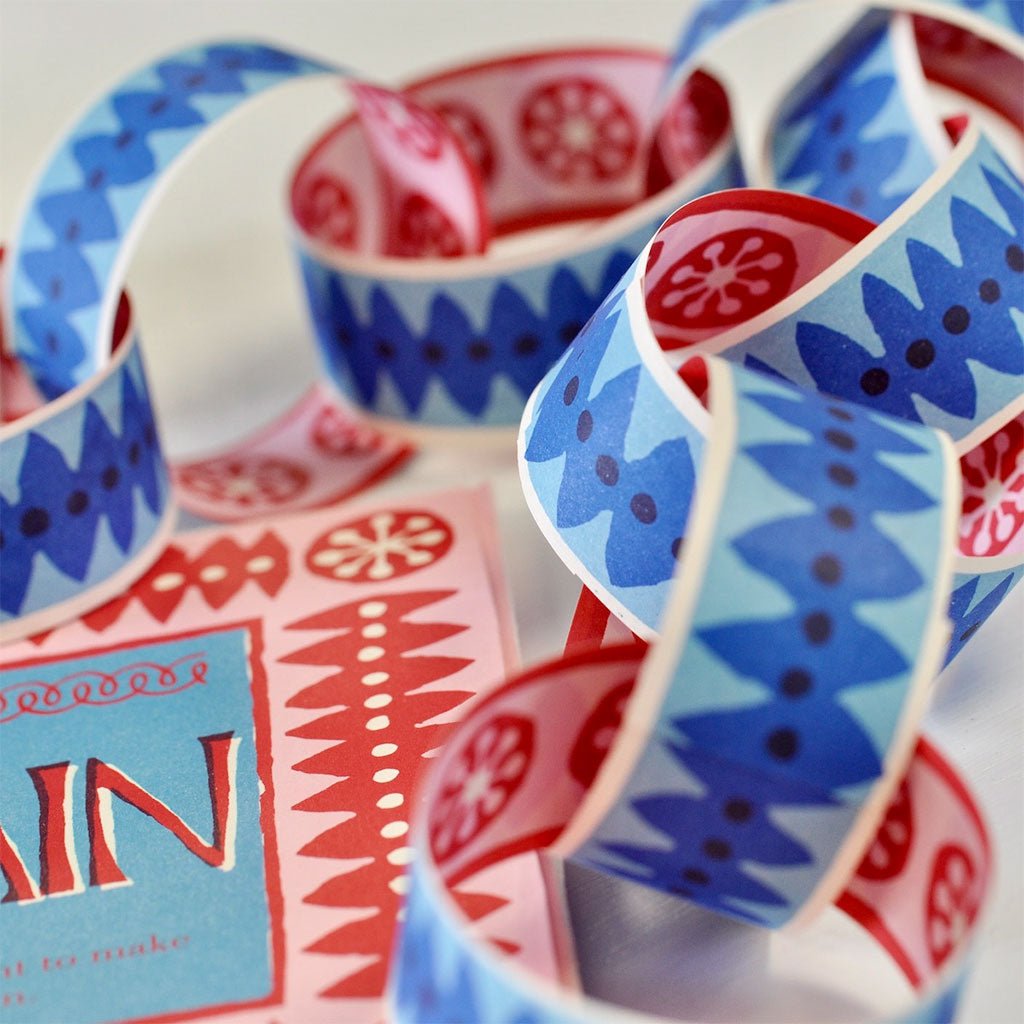 Decorative tape with blue and red patterns on a white background
