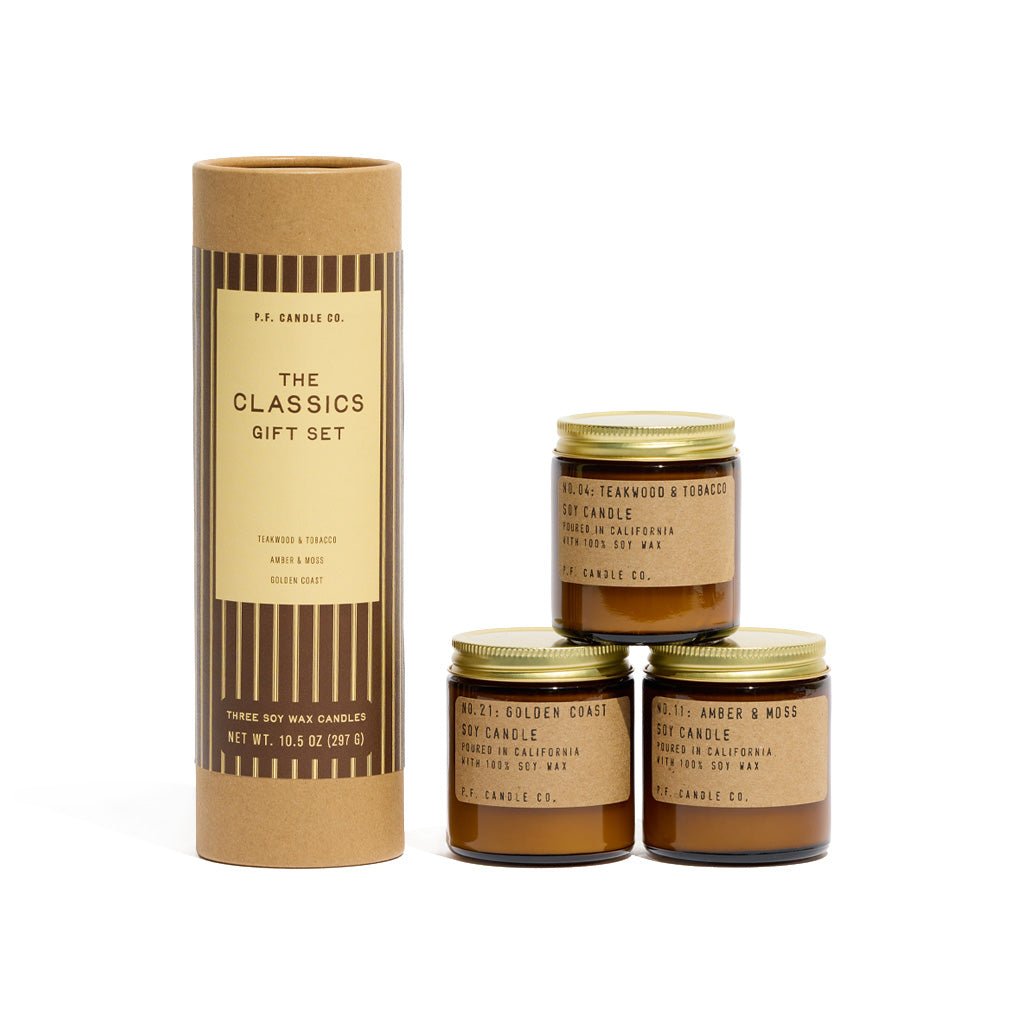 Classics Gift Set by P.F. Candle Co. with three mini candles stacked next to kraft tube packaging on white background