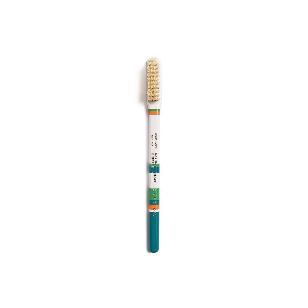 Teal and white colorful toothbrush on white background
