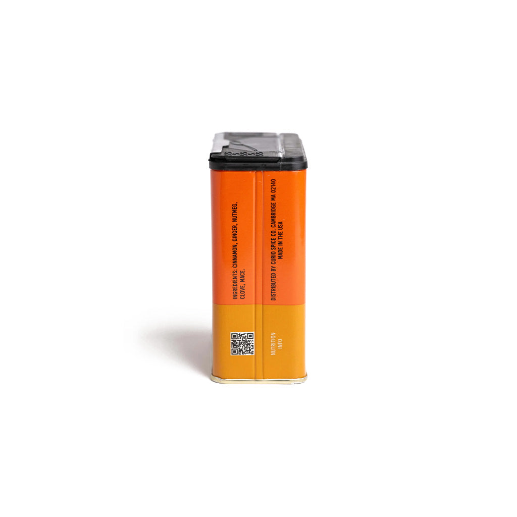 Orange tin of Curio Spice pumpkin spice everyday blend tin on white background