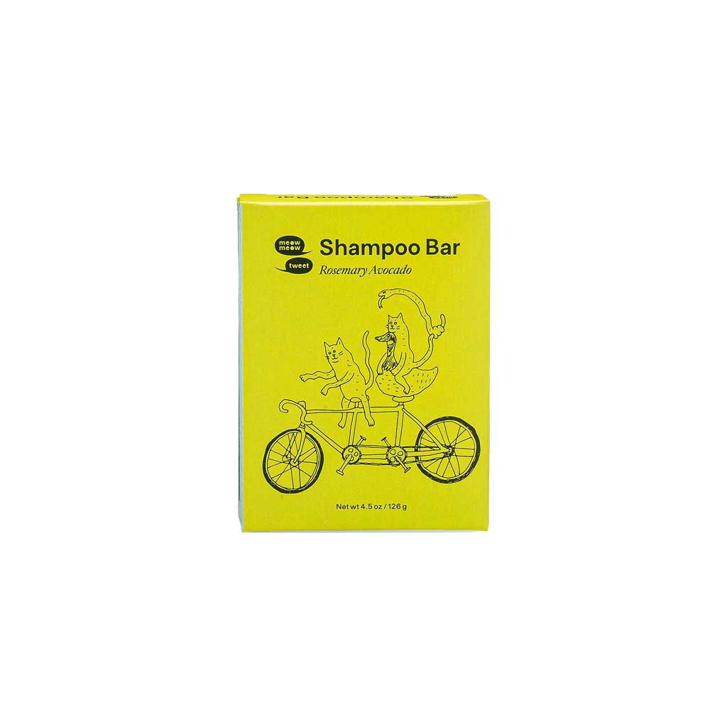 Yellow box of shampoo bar with cartoon characters on a white background