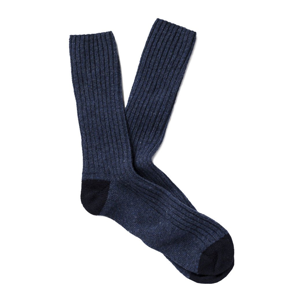 Pair of blue wool socks with dark blue heels and toes.