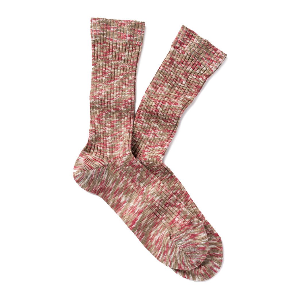 Pair of multicolored socks in a heathered blend of blush pink, sand, and cream.