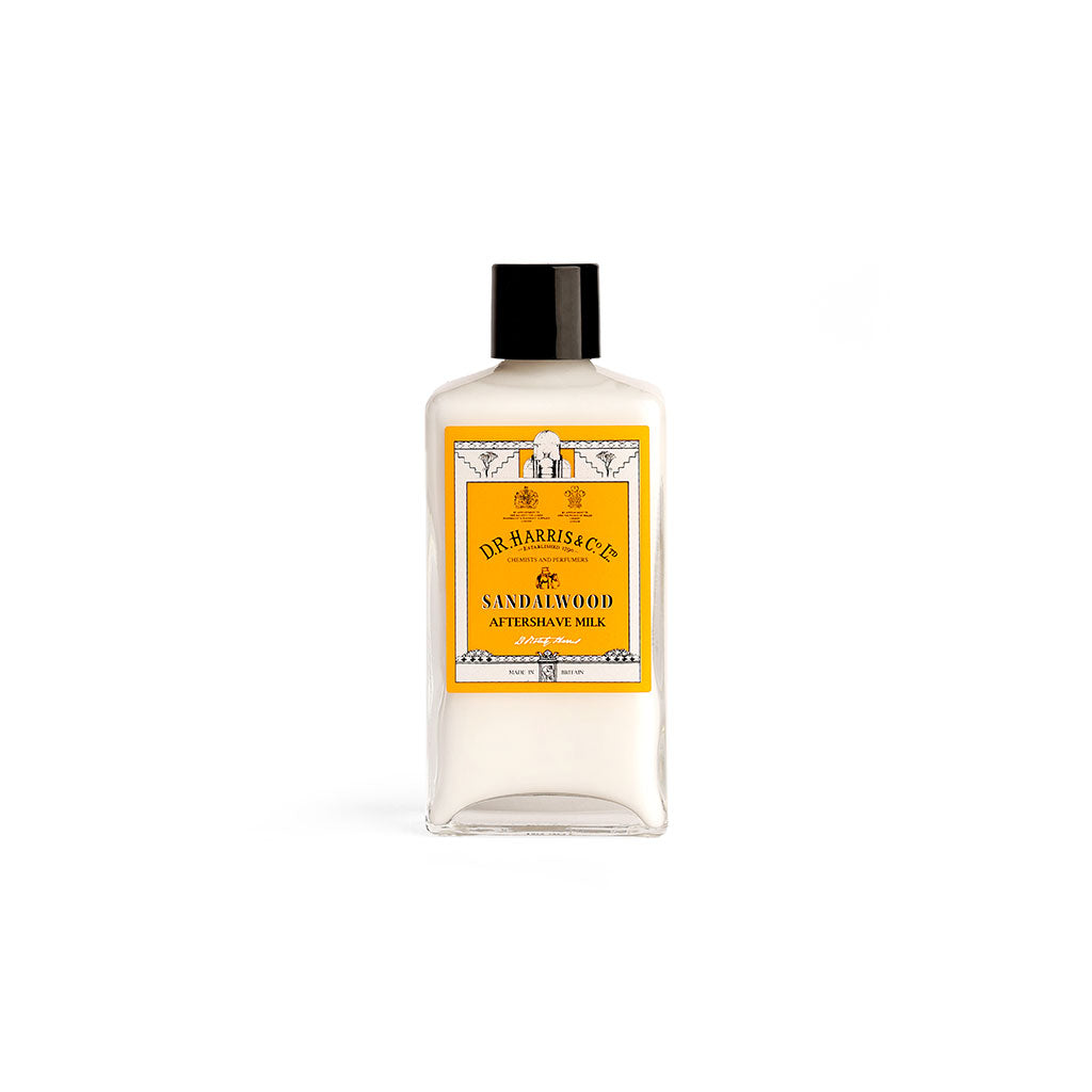 D.R. Harris Sandalwood aftershave milk in a glass bottle with a black top