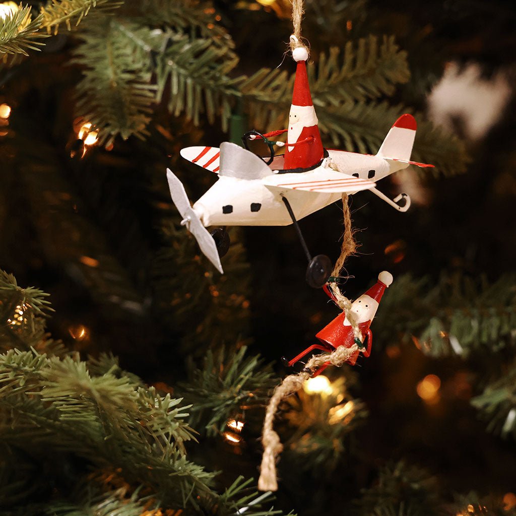 Santa Climbing on Plane Ornament Boston General Store