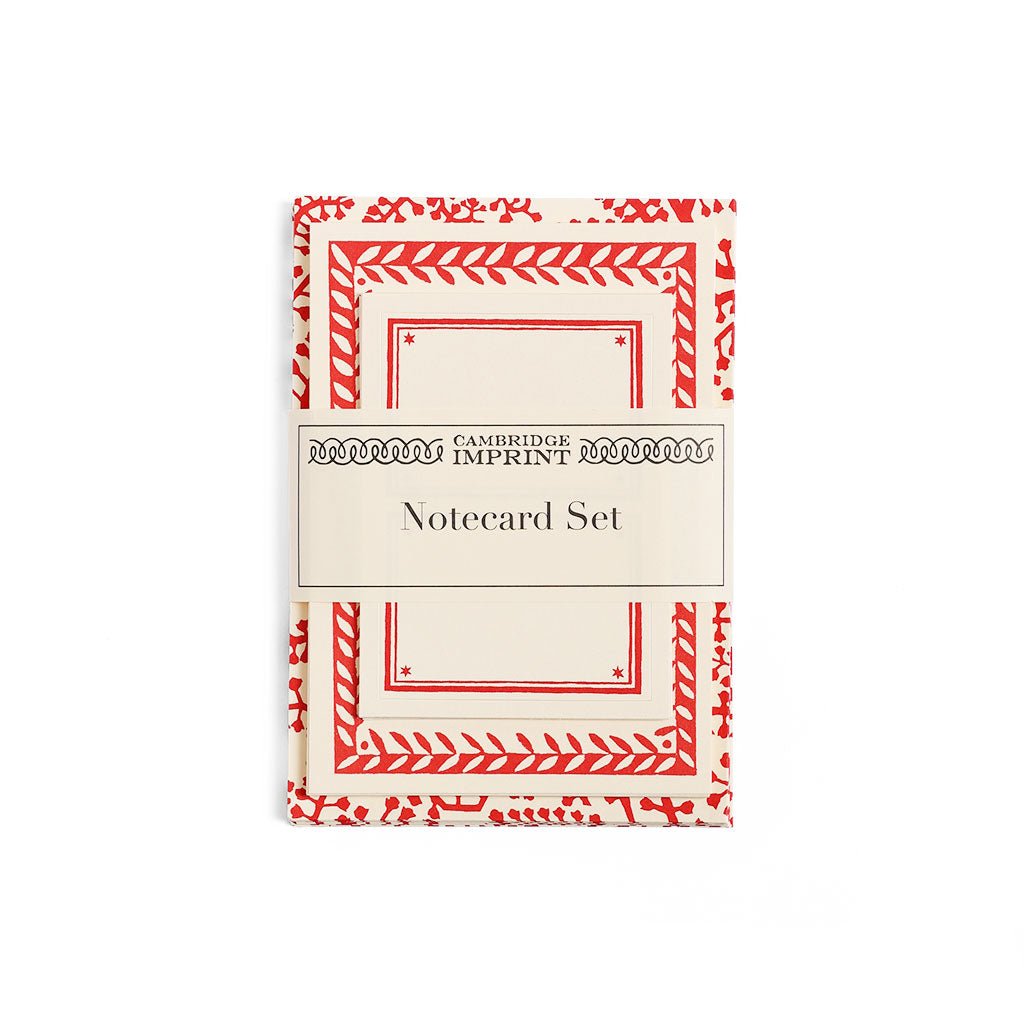 Notecard set with red border design on a white background