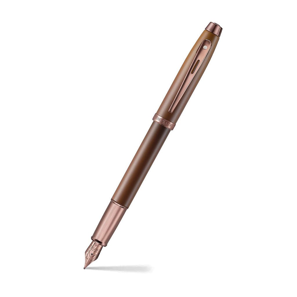 Brown rose gold fountain pen on a white background