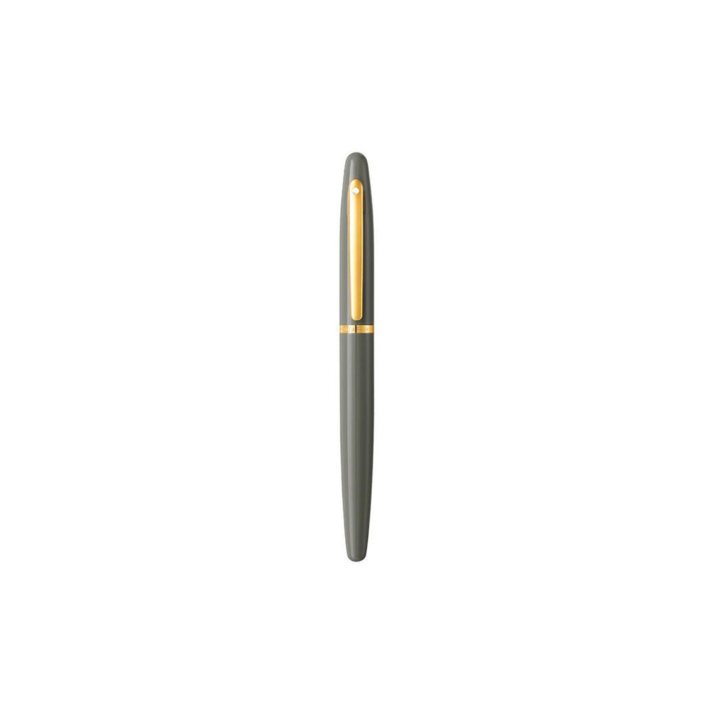 Grey rollerball pen with gold accents on white background