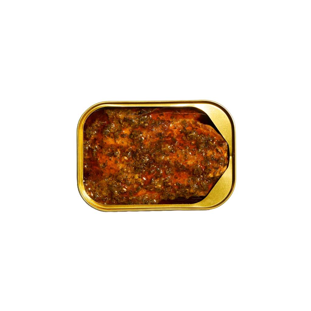 Open can of tinned Fishwife Smoked Trout with Red Chimichurri on white background