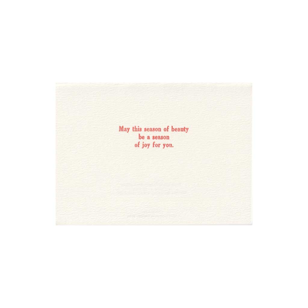 Inside message of card that reads May this season of beauty be a season of joy for you