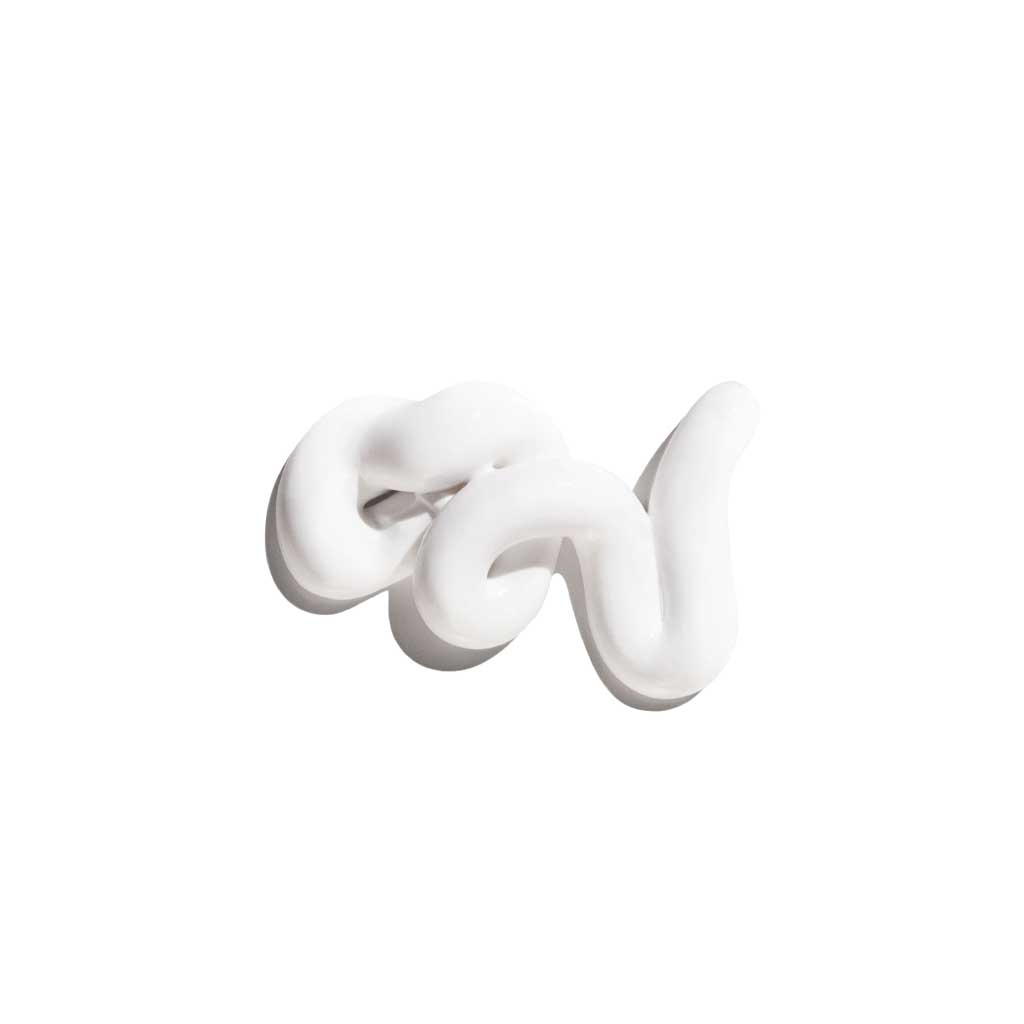 Dollop of shave cream on white background