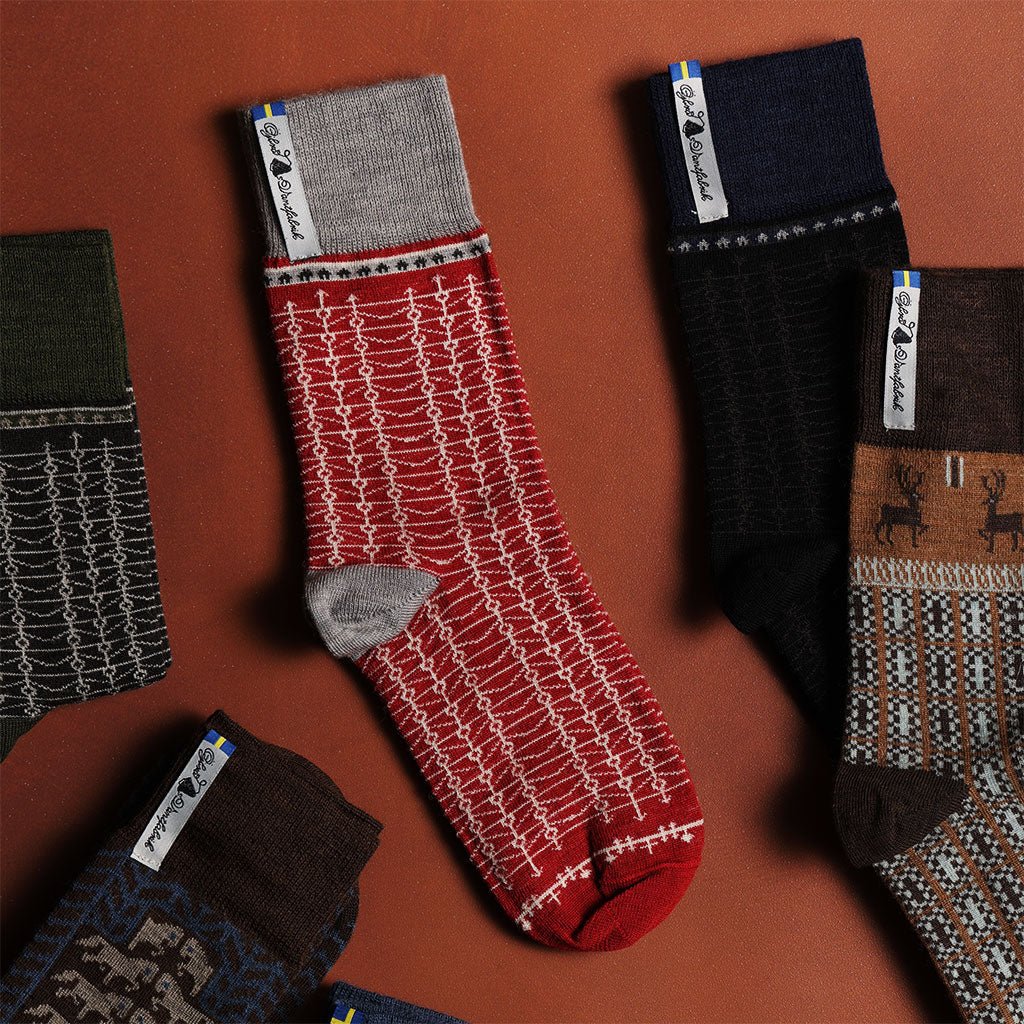 Collection of patterned socks on a brown background