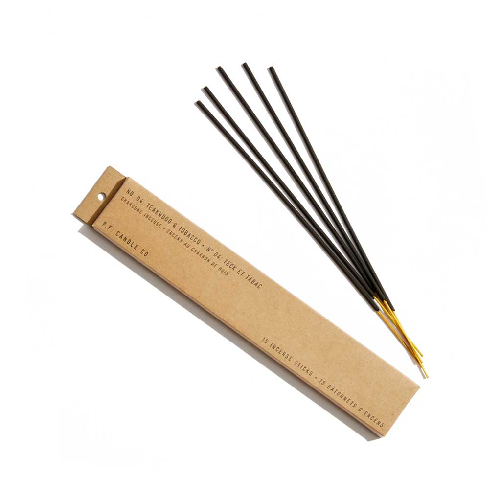 Incense sticks with a cardboard packaging on a white background