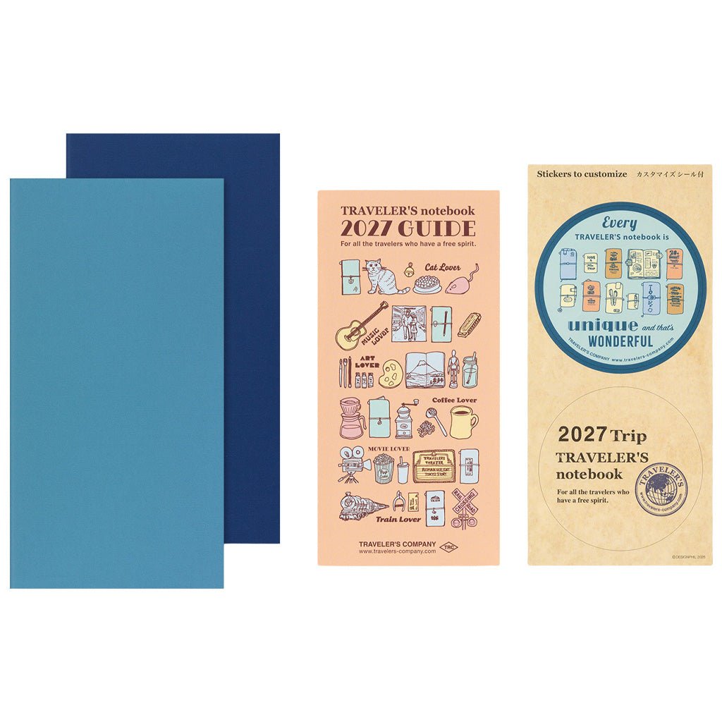Two blue Traveler's Notebook refills with 2027 Diary guide on white background