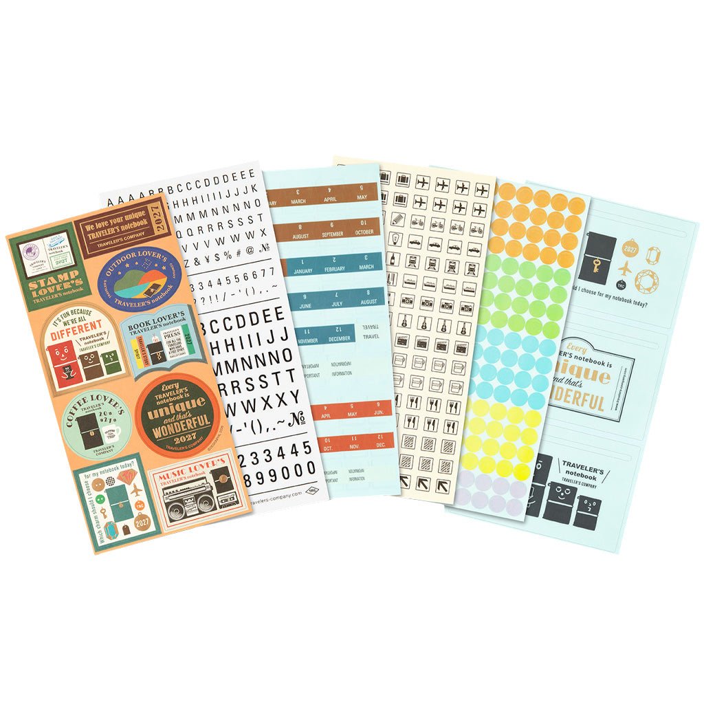 A set of colorful sticker sheets arranged in a fan shape on a plain white background.
