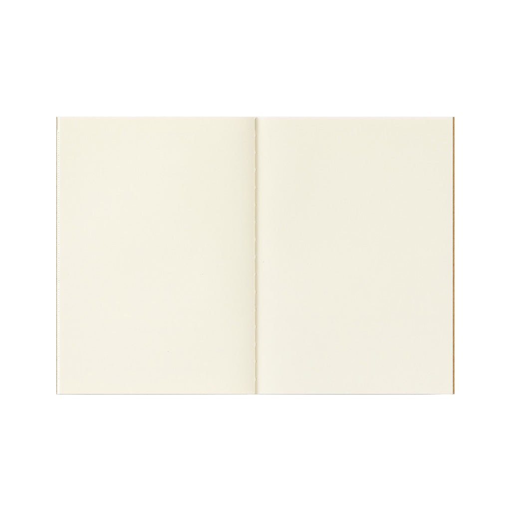 An open notebook with blank, warm cream-colored pages, shown against a solid white background.