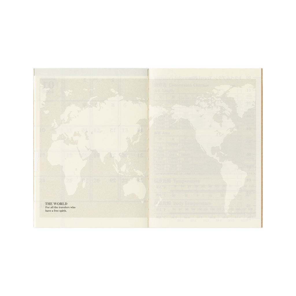 An open passport notebook refill with world map on white background.