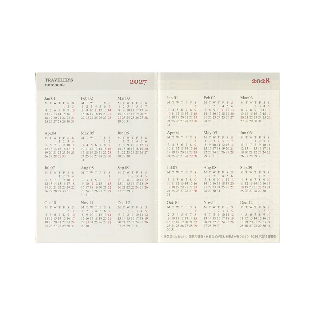 A two-page spread of a Japanese traveler's notebook passport calendar refill showing the years 2027 and 2028 with monthly grids in red and black text on a cream background.