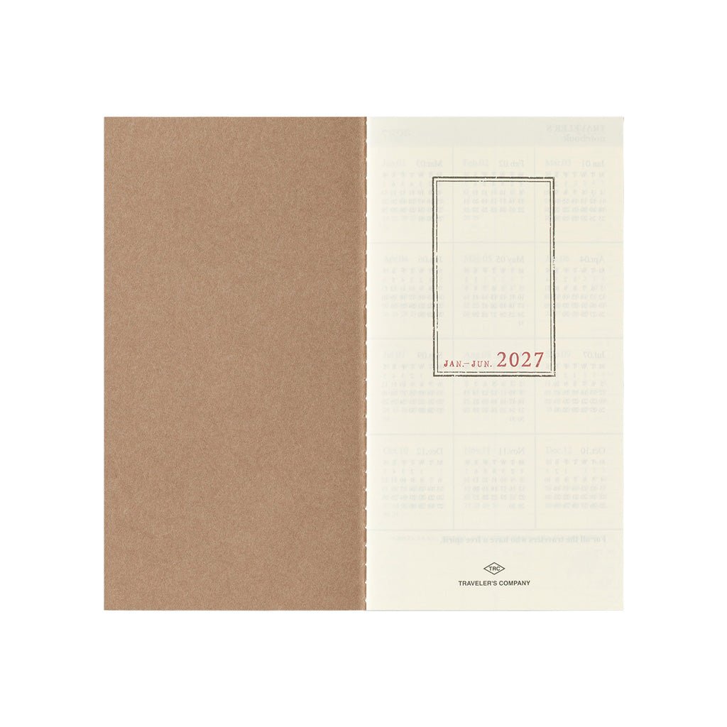 An open Traveler's Notebook refill for January through June 2027 on white background