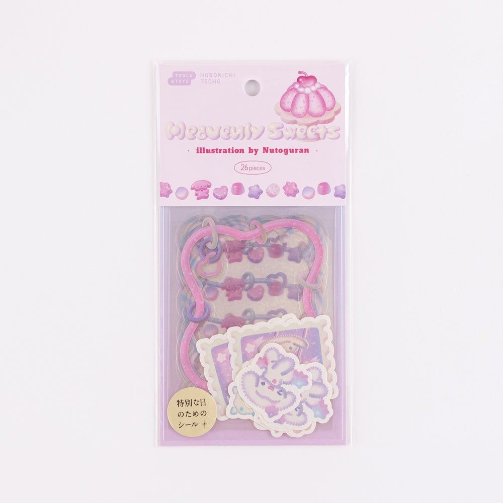 Packaged pastel pink and purple decorative stickers with illustrations on a white background