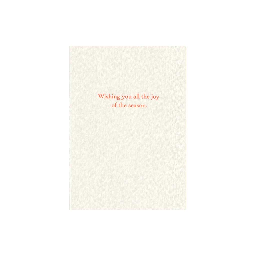 The interior of a greeting card with the words "Wishing you all the joy of the season."