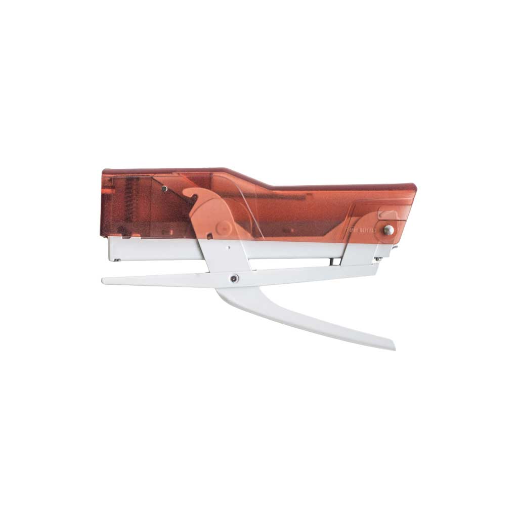 Handheld Zenith 590 stapler with transparent red body and white base on a white background