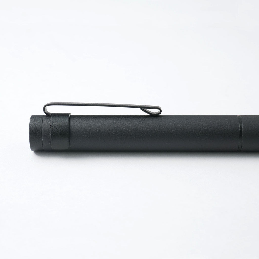Black pen on a white background