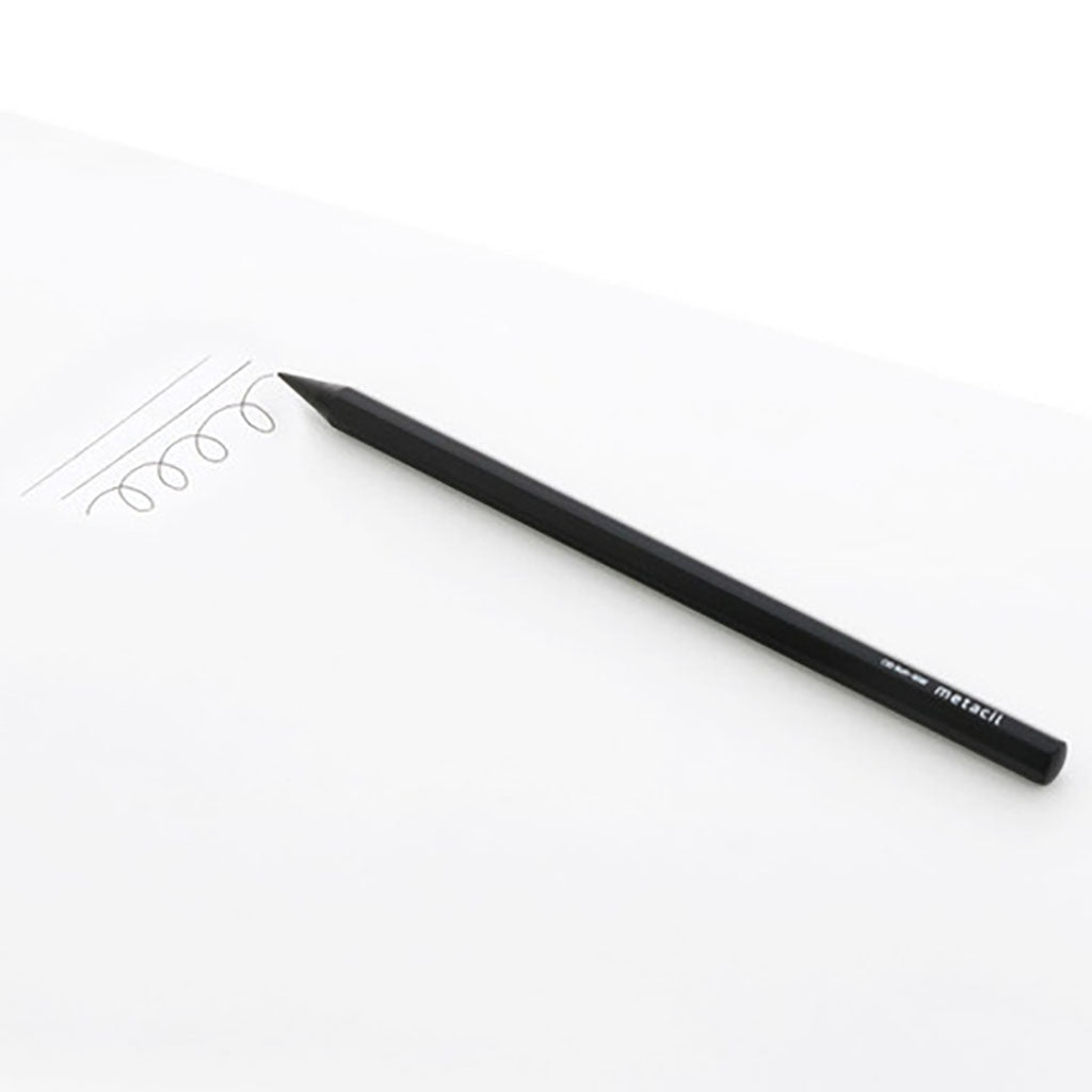 Black pencil on a white background