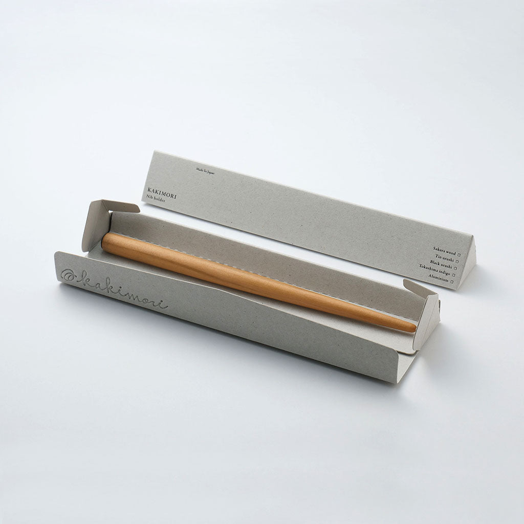 Sakura wood nib holder in gray box packaging on light surface