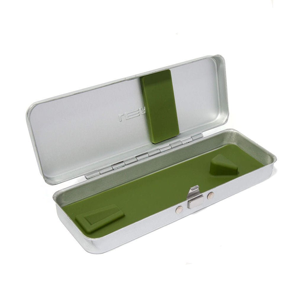 Silver aluminum Leaf razor travel case open with green silicone inserts on white background