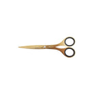 Gold-colored stainless steel scissors with black-rimmed finger loops on a white background.