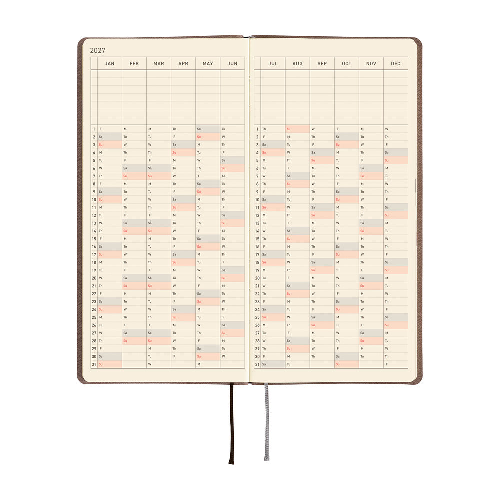 An open 2027 planner showing a two-page yearly calendar on cream pages.