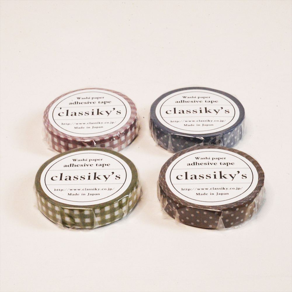 Four rolls of 'classiky's' adhesive washi tape on a white background