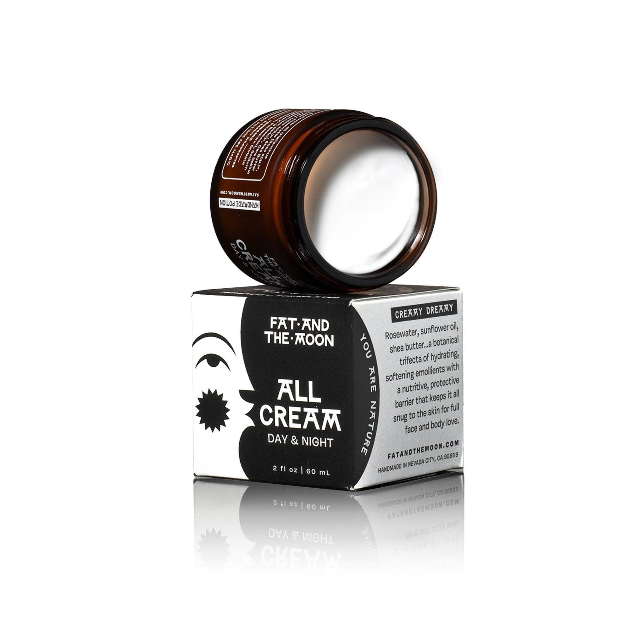 Open jar of all cream with packaging