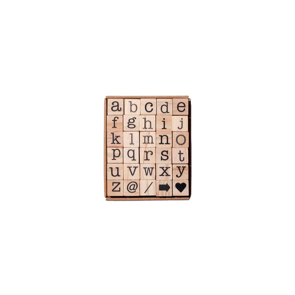 Set of 30 wooden stamps with lowercase letters and symbols in packaging on white background