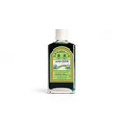 Bottle of D.R. Harris & Co. Alpine bath oil on a white background