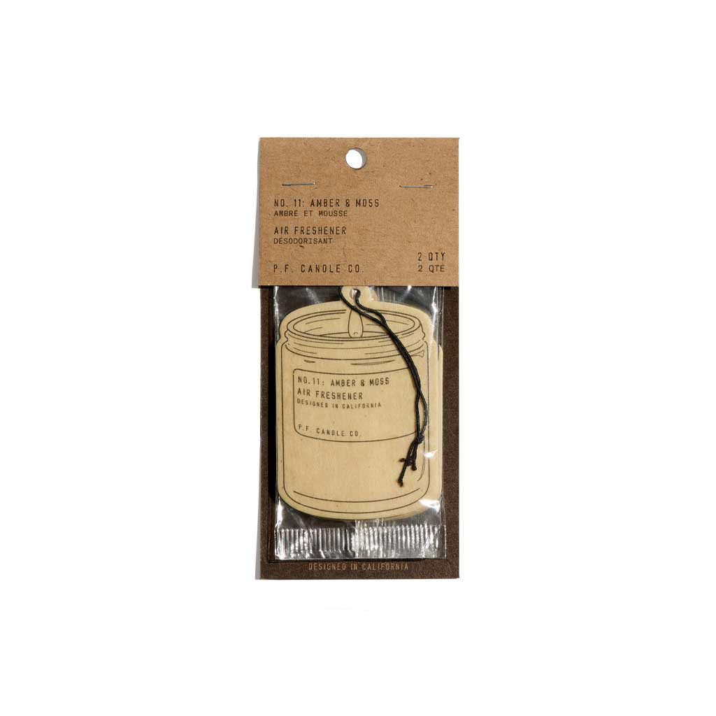 P.F. Candle Co air freshener packaging with a cardboard backing on a white background