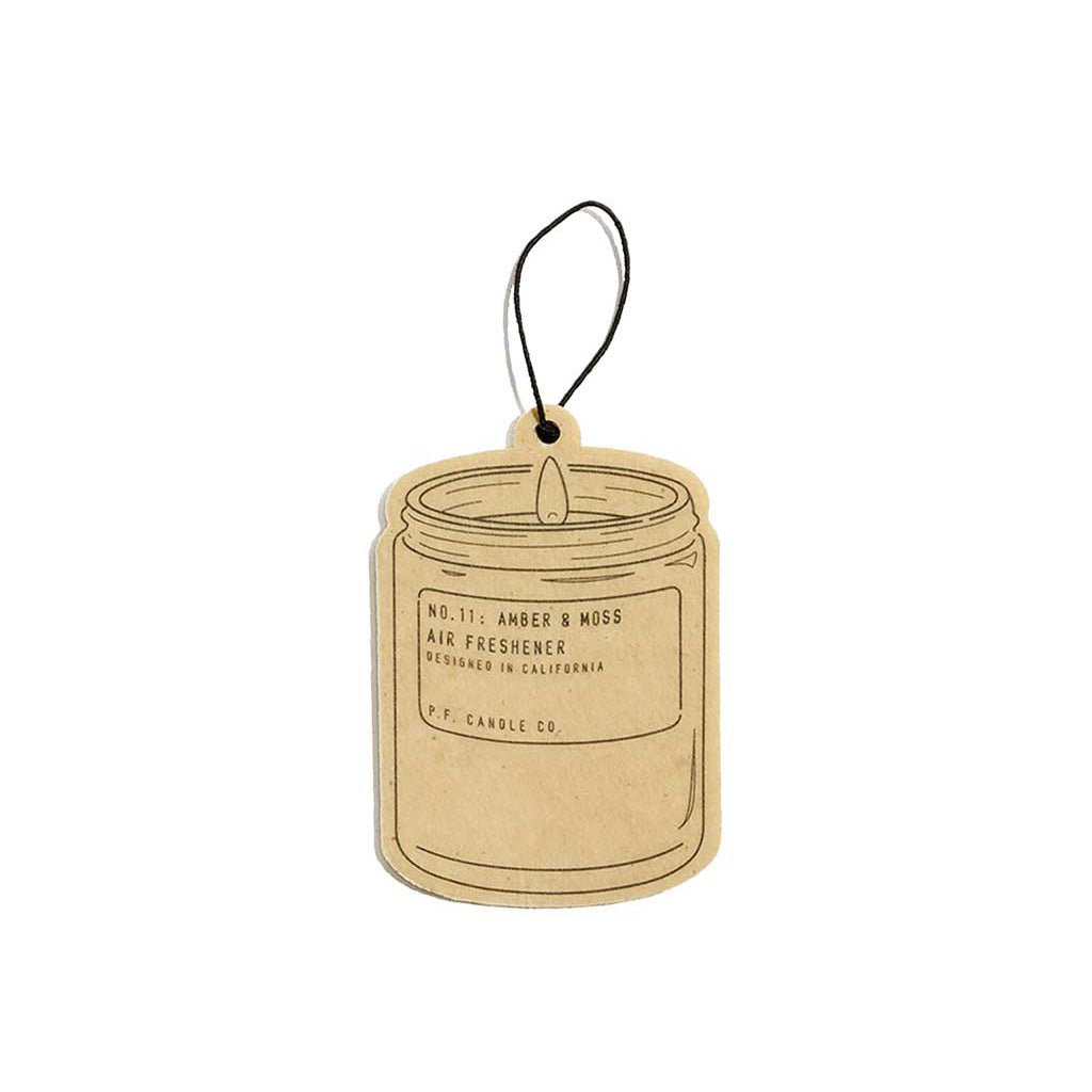 Amber & Moss air freshener tag on a white background