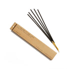 Incense sticks with a cardboard packaging on a white background