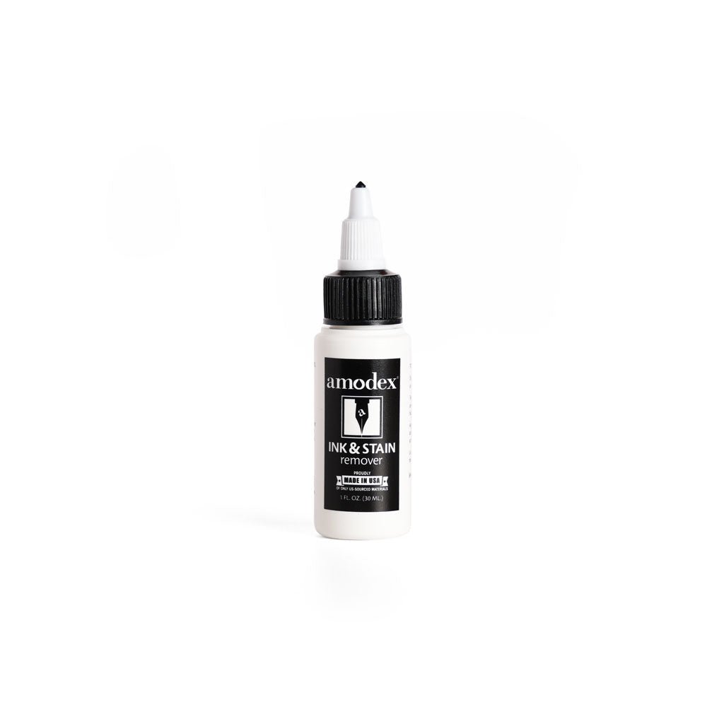 Bottle of Amodex Ink & Stain Remover on a white background