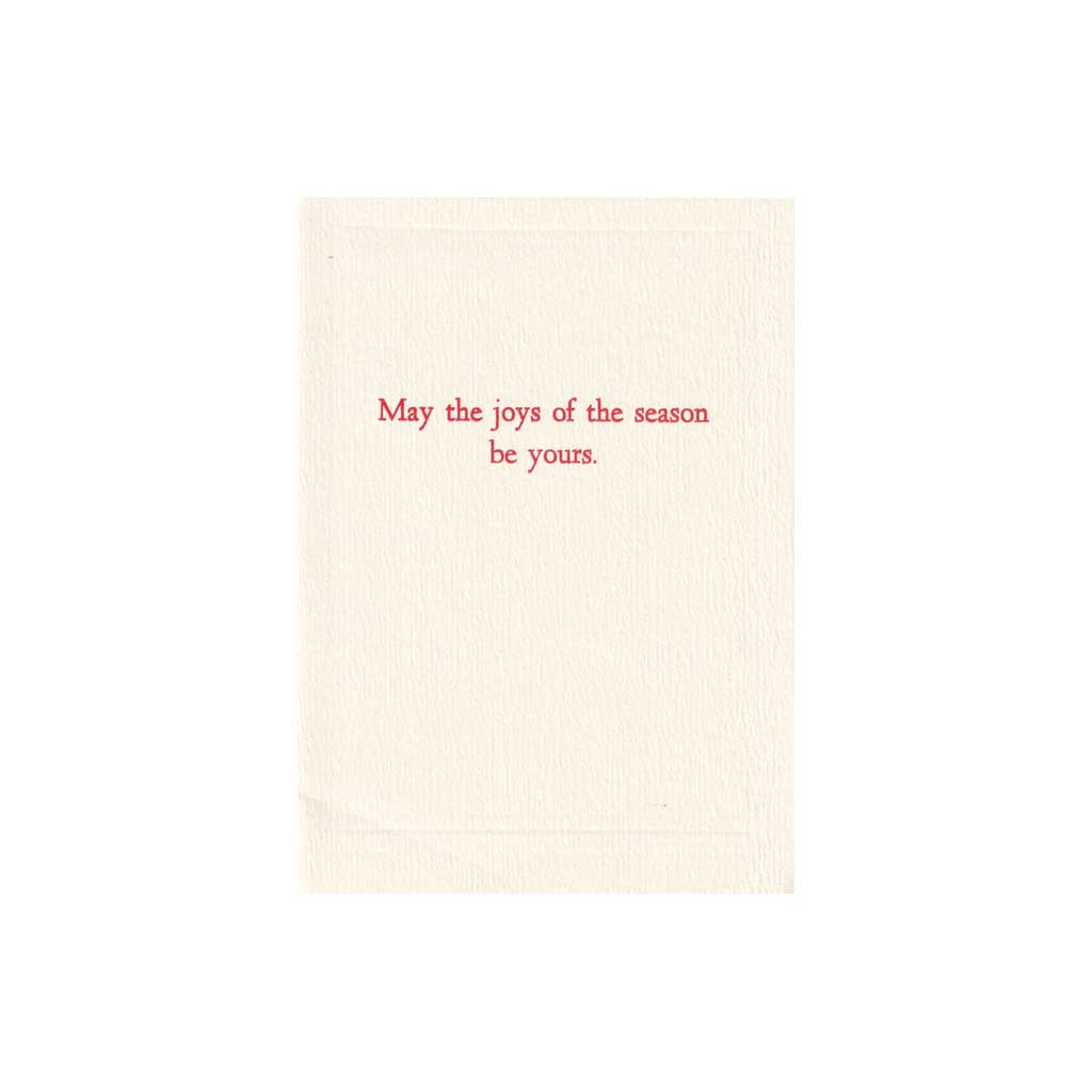 The inside of a greeting card. The text reads "May the joys of the season be yours."