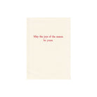 The inside of a greeting card. The text reads "May the joys of the season be yours."