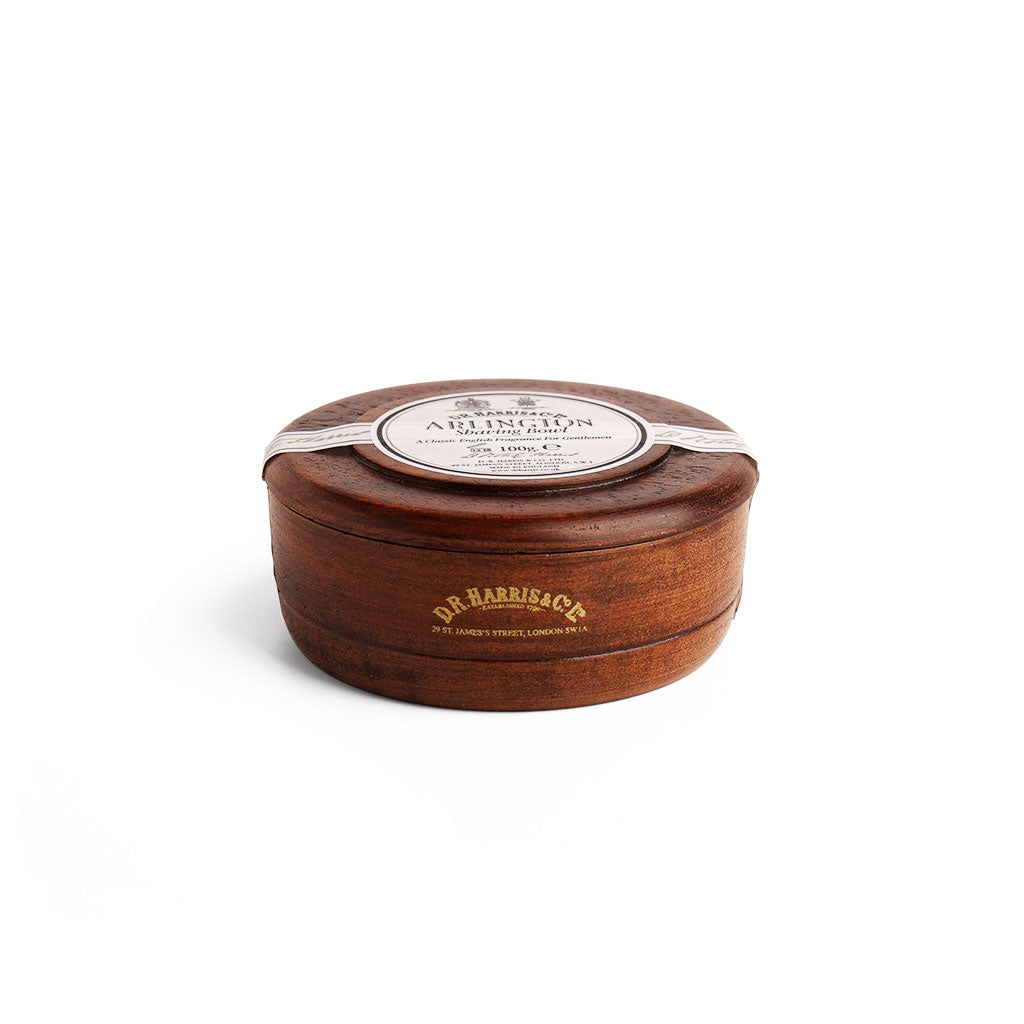 Wooden shaving bowl with an Arlington label on a white background