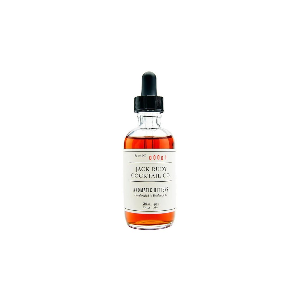Bottle of Jack Rudy Cocktail Co. bitters on a white background