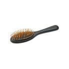 Wooden hairbrush with wooden pins on white background