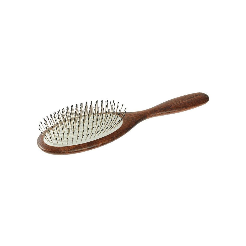 Wooden hairbrush with metal bristles on a white background