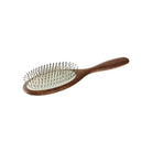 Wooden hairbrush with metal bristles on a white background
