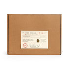 Brown cardboard box with a label on a white background