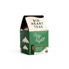 A green and cream colored box of Cozy Night herbal tea by Big Heart Tea co.