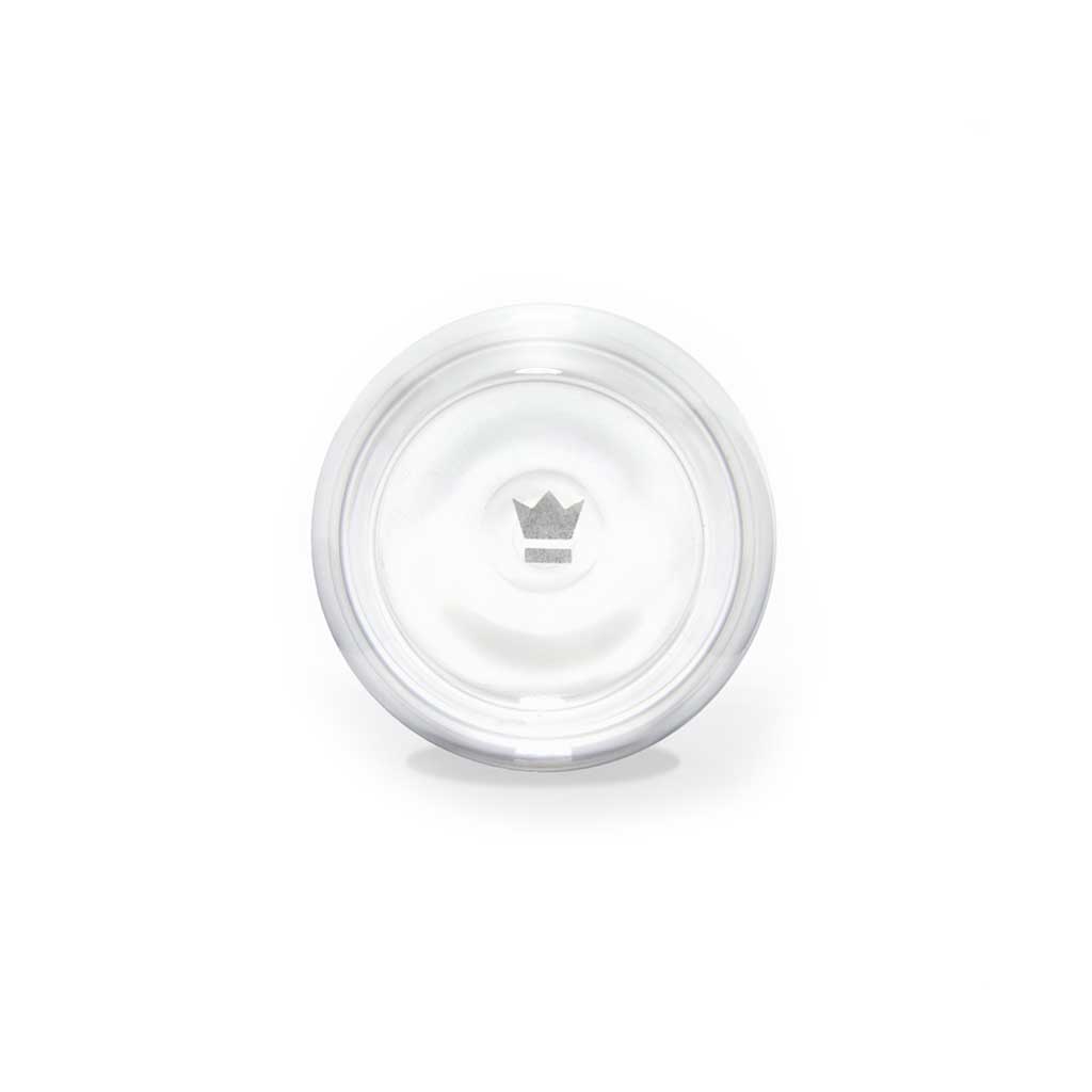 Bottom of clear glass bitters bottle with Cocktail Kingdom brand crown logo on white background